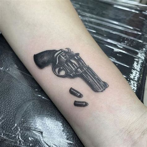 15 Most Creative Gun Tattoo Designs With Pictures 15 Most Creative Gun Tattoo Designs With Pictures