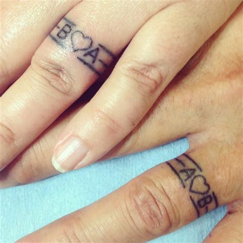 16 Wedding Ring Tattoos We Kind Of Love Ring Finger Tattoos Ring 16 Wedding Ring Tattoos We Kind Of Love Ring Finger Tattoos Ring