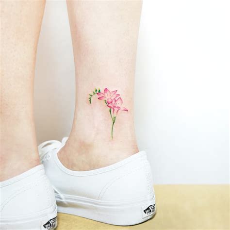 22 Beautiful And Delicate Freesia Tattoo Designs Tattooadore 22 Beautiful And Delicate Freesia Tattoo Designs Tattooadore