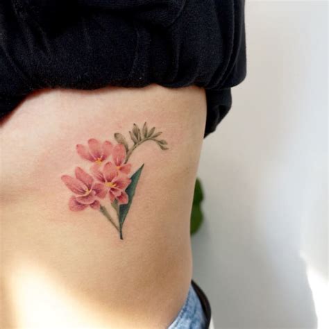 22 Simple Freesia Tattoo Designs Tattooadore 22 Simple Freesia Tattoo Designs Tattooadore