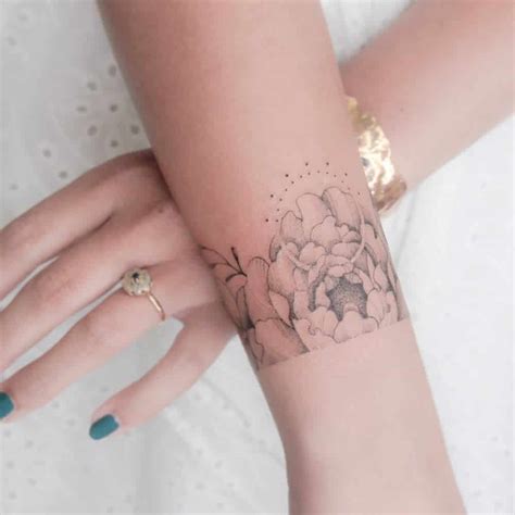Elegant Flower Wrist Tattoo Ideas For A Delicate Look Elegant Flower Wrist Tattoo Ideas For A Delicate Look