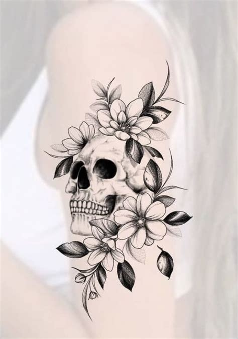 Feminine Skull Tattoo With Floral Design Feminine Skull Tattoo With Floral Design