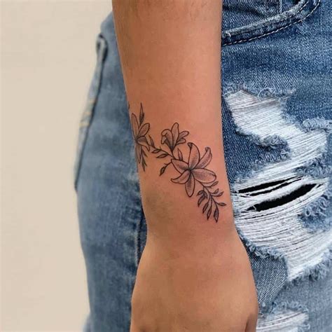 Nearly Two-Thirds Of Wearers Choose Flower Tattoos For Wrist Ink