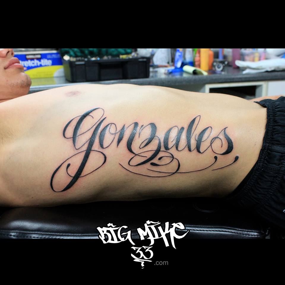 Gonzalez In Cursive Tattoo