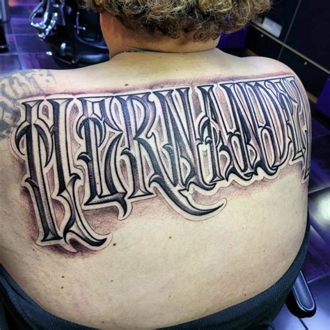 Last Name Back Tattoos