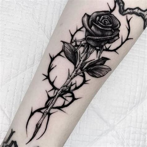 Rose With Thorns Tattoo Meaning