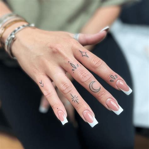 Tattoos In The Fingers