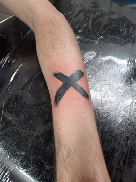 X Tattoo